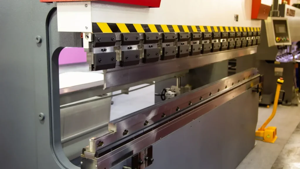 Thermal insulation coating protecting the machine base during high-power cutting of thick metal sheets at low feed rates.