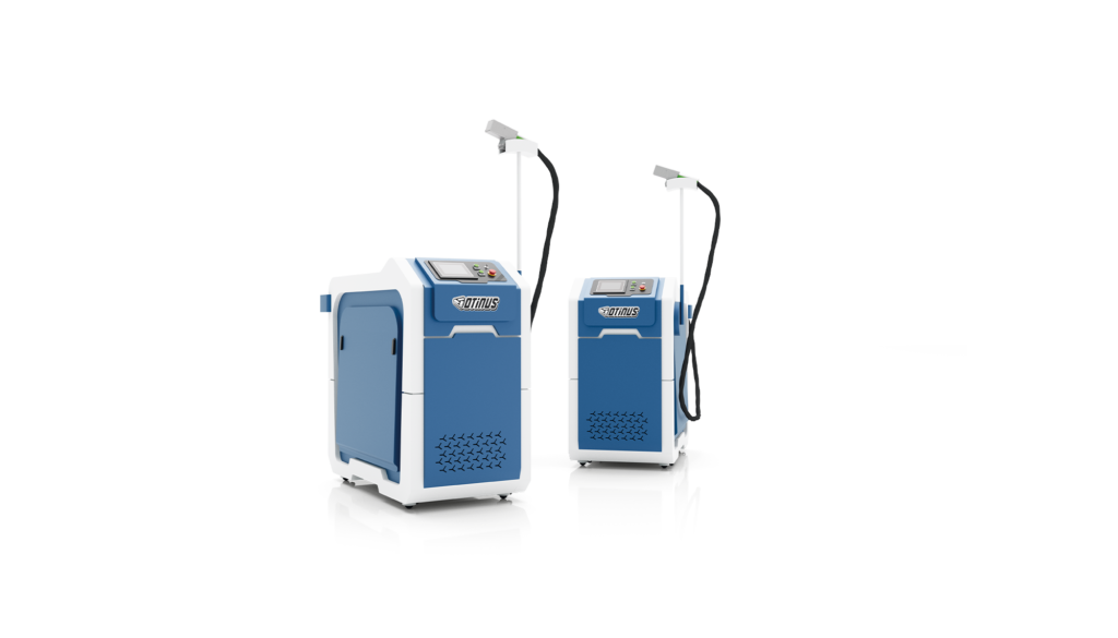Two compact Otinus laser cleaning machines in white-and-blue enclosures, equipped with connected handheld cleaning heads.